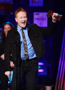 Conan O'Brien accepting his show's award for Best Comedy Podcast